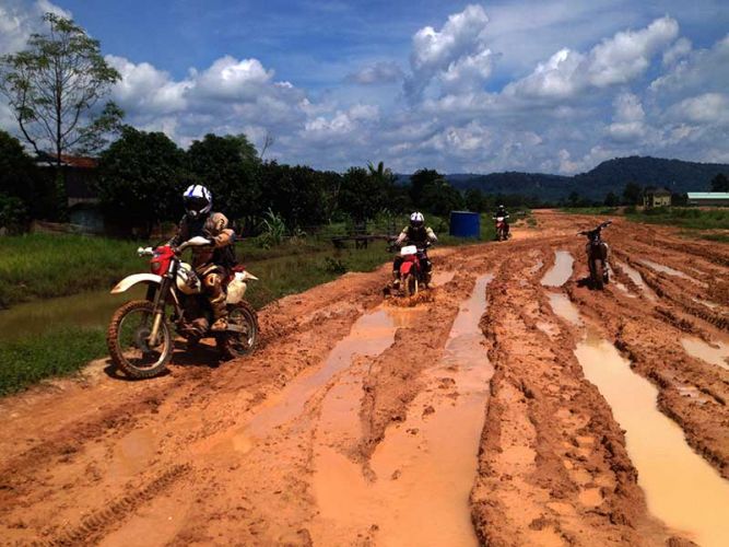 dirt-bike-tours-cambodia-muddy-ruts