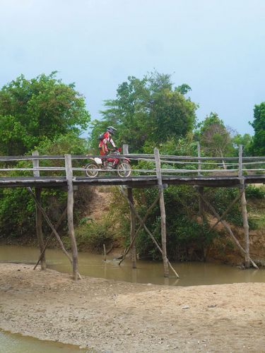 dirt-bike-tours-cambodia-bridge-crossing